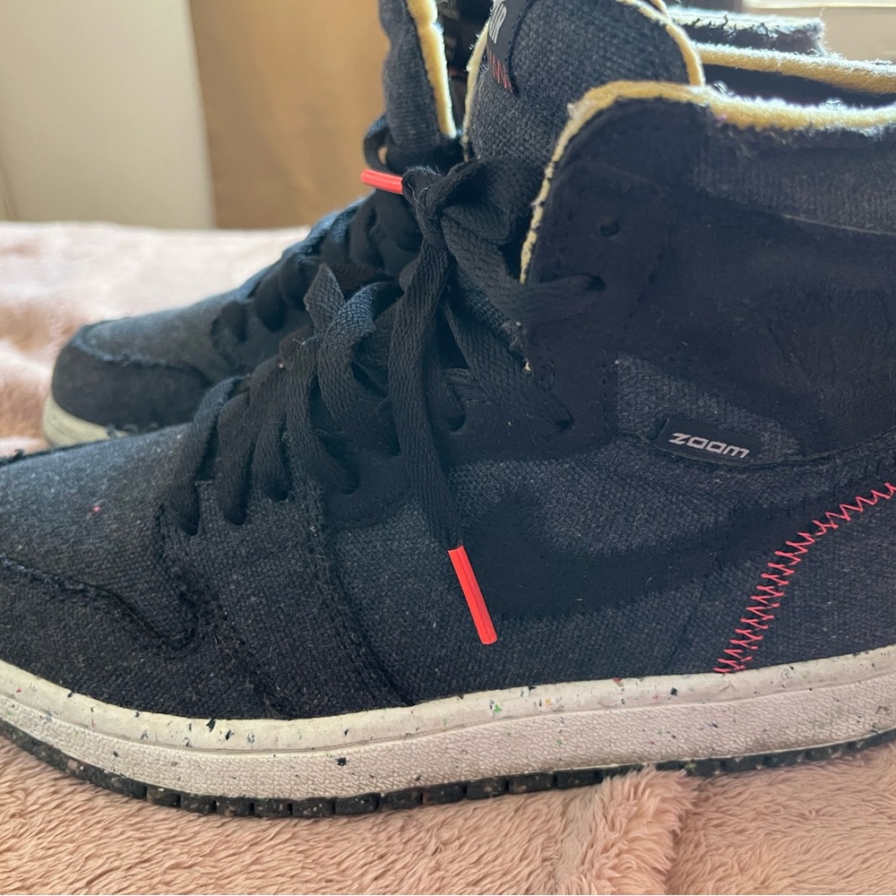 Black High-Top Sneakers with Red Stitching